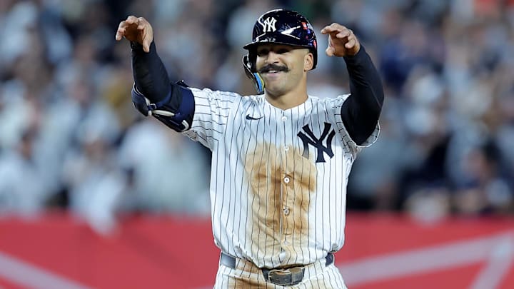 Oct 1, 2025; Bronx, New York, USA; New York Yankees center fielder Trent Grisham (12) celebrates his double against the Boston Red Sox during the seventh inning of game two of the Wildcard round of the 2025 MLB playoffs at Yankee Stadium. Mandatory Credit: Brad Penner-Imagn Images