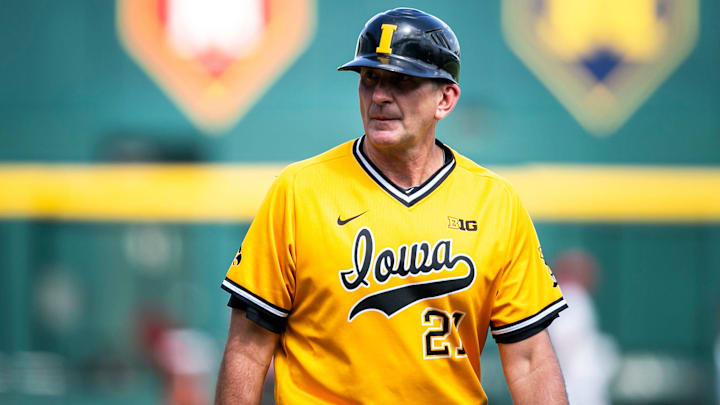 Iowa head coach Rick Heller walks on the field during the championship game of the Big Ten Baseball Tournament against Maryland, Sunday, May 28, 2023, at Charles Schwab Field in Omaha, Neb.