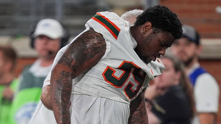 Sep 18, 2026; Winston-Salem, North Carolina, USA; (Editors Notes: Caption Correction) Miami (FL) Hurricanes defensive lineman Ahmad Moten Sr. (99) is helped back to the locker room with an injury during the first half against the Wake Forest Demon Deacons at Allegacy Federal Credit Union Stadium.  Mandatory Credit: Jim Dedmon-Imagn Images