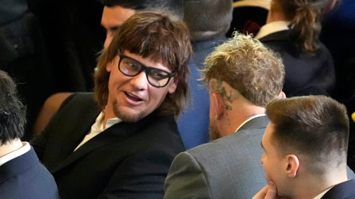 Comedian Theo Von, left speaks with Jake Paul in the viewing area in Emancipation Hall during the 2025 Presidential Inauguration at the U.S. Capitol. 