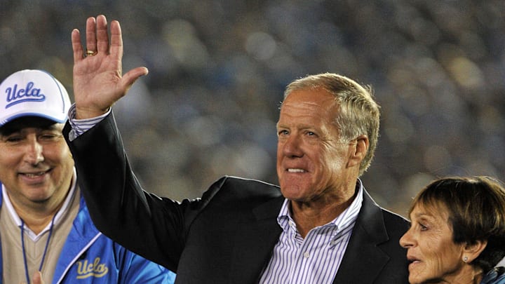 Oct 12, 2013; Pasadena, CA, USA; UCLA Bruins former coach and player Terry Donahue waves to the crowd during a ceremony honoring him during the game against the California Golden Bears at the Rose Bowl. Mandatory Credit: Robert Hanashiro-Imagn Images