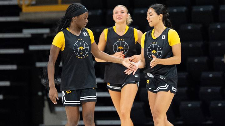 Iowa guard Journey Houston (8) high-fives Iowa guard Bria Medina (50) during practice June 25, 2026 at Carver-Hawkeye Arena in Iowa City, Iowa.