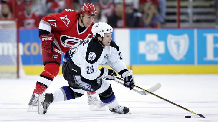 Apr 14, 2006; Raleigh, NC, USA; Tampa Bay Lightning right wing (26) Martin St. Louis loses the puck during the 1st period at the RBC Center. Mandatory Credit: James Guillory-Imagn Images Copyright (c) 2006 James Guillory Apr 14, 2006; Raleigh, NC, USA; Tampa Bay Lightning right wing (26) Martin St. Louis loses the puck during the 1st period at the RBC Center. Mandatory Credit: James Guillory-Imagn Images Copyright (c) 2006 James Guillory