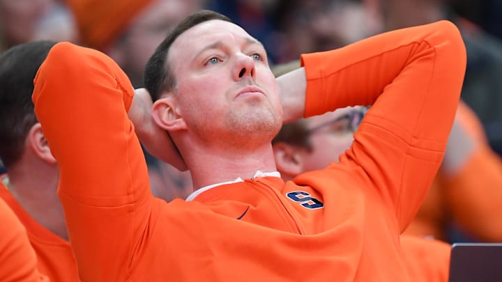 Jan 20, 2024; Syracuse, New York, USA; Syracuse Orange associate head coach Gerry McNamara reacts to a play against the Miami (Fl) Hurricanes during the second half at the JMA Wireless Dome. Mandatory Credit: Rich Barnes-Imagn Images