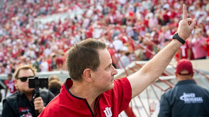 Indiana Head Coach Curt Cignetti holds up the number one to the crowd as he leaves the field after the Indiana versus Wisconson football game at Memorial Stadium on Saturday, Nov. 15, 2025.