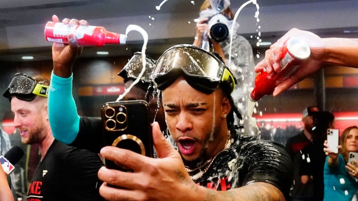 Sep 30, 2023; Phoenix, AZ, USA; Arizona Diamondbacks second baseman Ketel Marte during celebrations after clinching a wild card playoff spot following their game with the Houston Astros at Chase Field. Mandatory Credit: Rob Schumacher-Arizona Republic