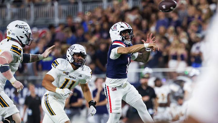 Sep 5, 2026; Tucson, Arizona, USA; Arizona Wildcats quarterback Noah Fifita (1) throws a touchdown pass during the second quarter of the game against the Northern Arizona Lumberjacks at Casino Del Sol Stadium. Sep 5, 2026; Tucson, Arizona, USA; Arizona Wildcats quarterback Noah Fifita (1) throws a touchdown pass during the second quarter of the game against the Northern Arizona Lumberjacks at Casino Del Sol Stadium.