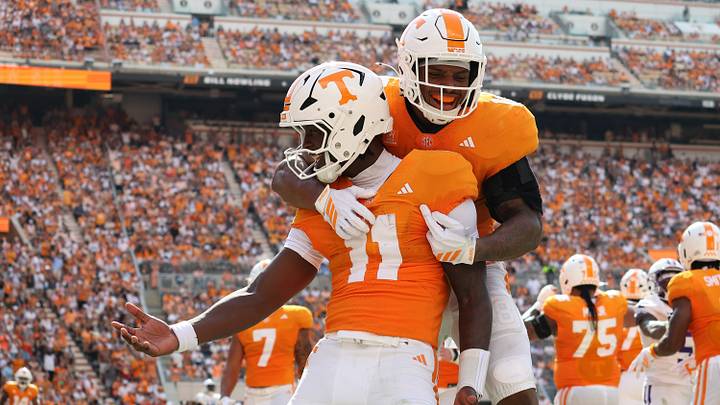 Sep 5, 2026; Knoxville, Tennessee, USA; Tennessee Volunteers quarterback Faizon Brandon (11) and running back DeSean Bishop (18) celebrate a touchdown against the Furman Paladins during the first half at Neyland Stadium. Mandatory Credit: Randy Sartin-Imagn Images Sep 5, 2026; Knoxville, Tennessee, USA; Tennessee Volunteers quarterback Faizon Brandon (11) and running back DeSean Bishop (18) celebrate a touchdown against the Furman Paladins during the first half at Neyland Stadium. Mandatory Credit: Randy Sartin-Imagn Images