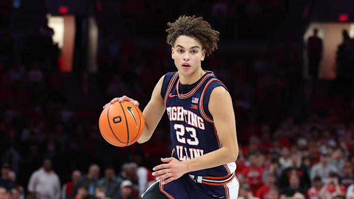 Dec 9, 2025; Columbus, Ohio, USA; Illinois Fighting Illini guard Andrej Stojakovic (2) brings the ball up court as Ohio State Buckeyes guard John Mobley Jr. (0) defends during the first half Value City Arena. Mandatory Credit: Joseph Maiorana-Imagn Images