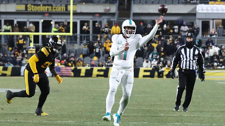 Miami Dolphins quarterback Tua Tagovailoa (1) throws a touchdown pass against the Pittsburgh Steelers during the fourth quarter at Acrisure Stadium.