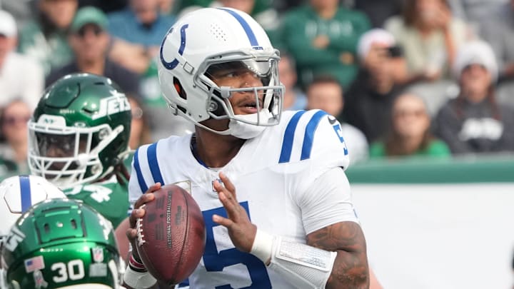 Nov 17, 2024; East Rutherford, New Jersey, USA; Indianapolis Colts quarterback Anthony Richardson (5) looks to pass against the New York Jets during the first quarter at MetLife Stadium. Mandatory Credit: Robert Deutsch-Imagn Images
