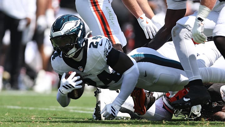 Aug 16, 2025; Philadelphia, Pennsylvania, USA; Philadelphia Eagles safety Andrew Mukuba (24) recovers a fumble against the Cleveland Browns during the second quarter at Lincoln Financial Field. Mandatory Credit: Bill Streicher-Imagn Images
