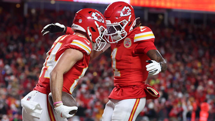 Jan 26, 2025; Kansas City, MO, USA; Kansas City Chiefs wide receiver Justin Watson (84) reacts with wide receiver Xavier Worthy (1) after making a catch for a two point conversion against the Buffalo Bills during the second half in the AFC Championship game at GEHA Field at Arrowhead Stadium. Mandatory Credit: Mark J. Rebilas-Imagn Images