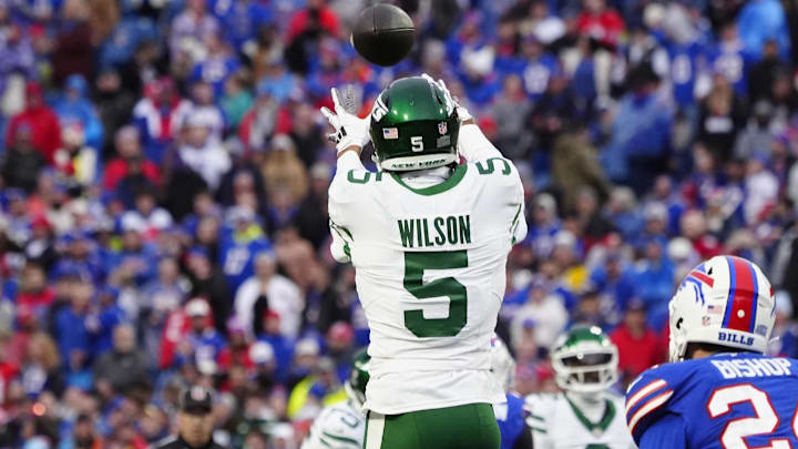 Dec 29, 2024; Orchard Park, New York, USA; New York Jets wide receiver Garrett Wilson (5) makes a catch against the Buffalo Bills during the second half at Highmark Stadium. Mandatory Credit: Gregory Fisher-Imagn Images