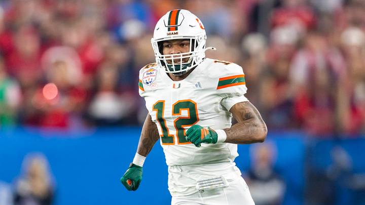 Jan 8, 2026; Glendale, AZ, USA; Miami Hurricanes defensive lineman Marquise Lightfoot (12) against the Mississippi Rebels during the 2026 Fiesta Bowl and semifinal game of the College Football Playoff at State Farm Stadium. Mandatory Credit: Mark J. Rebilas-Imagn Images