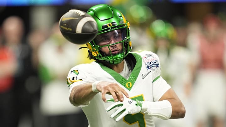 Oregon Ducks quarterback Dante Moore (5) throws a pass during the fourth quarter the 2025 Peach Bowl