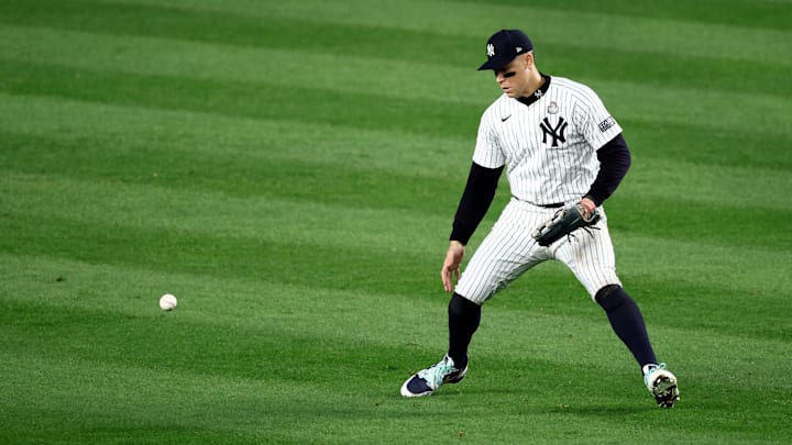 Oct 30, 2024; New York, New York, USA; New York Yankees outfielder Aaron Judge (99) makes a fielding error during the fifth inning against the Los Angeles Dodgers in game five of the 2024 MLB World Series at Yankee Stadium. Mandatory Credit: Wendell Cruz-Imagn Images Oct 30, 2024; New York, New York, USA; New York Yankees outfielder Aaron Judge (99) makes a fielding error during the fifth inning against the Los Angeles Dodgers in game five of the 2024 MLB World Series at Yankee Stadium. Mandatory Credit: Wendell Cruz-Imagn Images