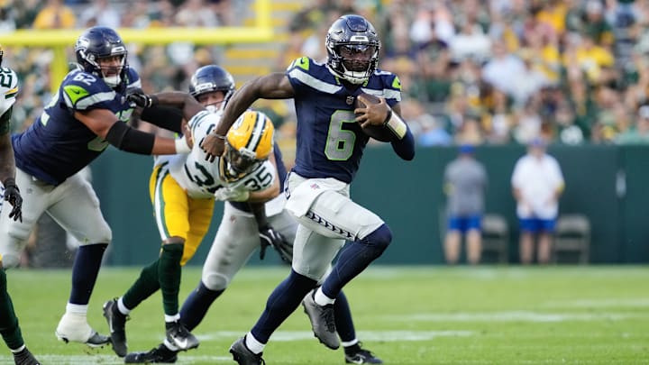 Aug 23, 2025; Green Bay, Wisconsin, USA; Seattle Seahawks quarterback Jalen Milroe (6) rushes with the football during the fourth quarter against the Green Bay Packers at Lambeau Field.