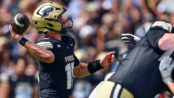 Purdue Boilermakers quarterback Ryan Browne (15) throws a pass.