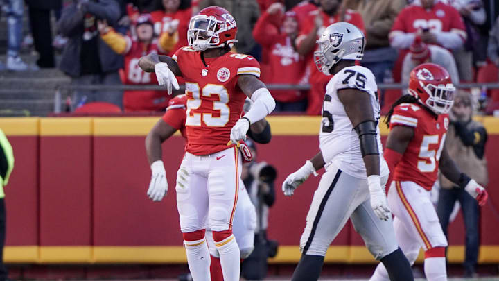 Dec 12, 2021; Kansas City, Missouri, USA; Kansas City Chiefs defensive back Armani Watts (23) celebrates after a defensive fumble recovery against the Las Vegas Raiders during the game at GEHA Field at Arrowhead Stadium. Mandatory Credit: Denny Medley-Imagn Images