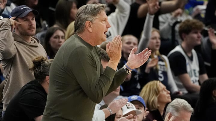 Minnesota Timberwolves head coach Chris Finch cheers on his team as they play the Phoenix Suns in the third quarter at Target Center in Minneapolis on March 28, 2025. Minnesota Timberwolves head coach Chris Finch cheers on his team as they play the Phoenix Suns in the third quarter at Target Center in Minneapolis on March 28, 2025.