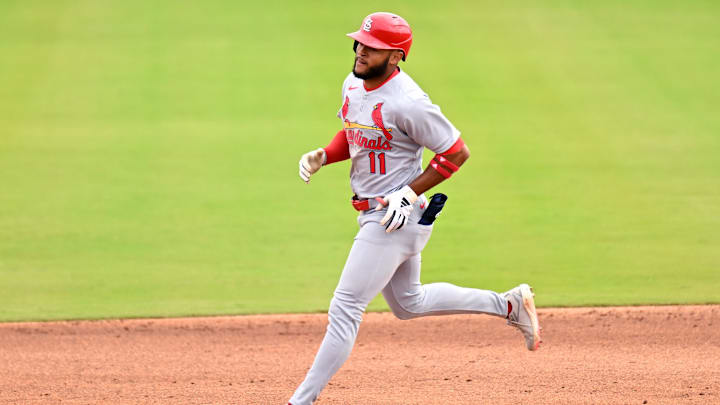 Feb 25, 2025; Dunedin, Florida, USA;St. Louis Cardinals left fielder Victor Scott II (11) rounds the bases after hitting a solo home run against the St. Louis Cardinals in the third inning of a spring training game at TD Ballpark. Mandatory Credit: Jonathan Dyer-Imagn Images
