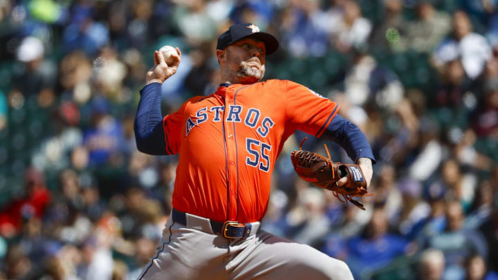 May 30, 2024; Seattle, Washington, USA; Houston Astros relief pitcher Ryan Pressly (55) throws against the Seattle Mariners during the eighth inning at T-Mobile Park.