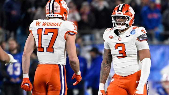 Dec 7, 2024; Charlotte, NC, USA; Clemson Tigers defensive end T.J. Parker (3) celebrates with linebacker Wade Woodaz (17) after a play during the second quarter against the Southern Methodist Mustangs in the 2024 ACC Championship game at Bank of America Stadium. Mandatory Credit: Bob Donnan-Imagn Images