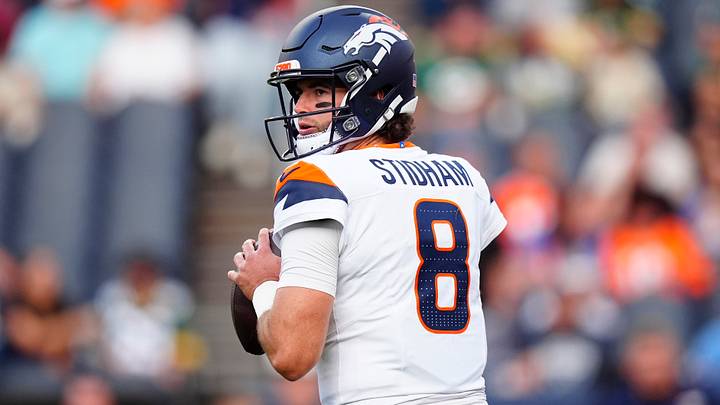 Denver Broncos quarterback Jarrett Stidham (8) before the preseason game against the Green Bay Packers at Empower Field at Mile High. Denver Broncos quarterback Jarrett Stidham (8) before the preseason game against the Green Bay Packers at Empower Field at Mile High.