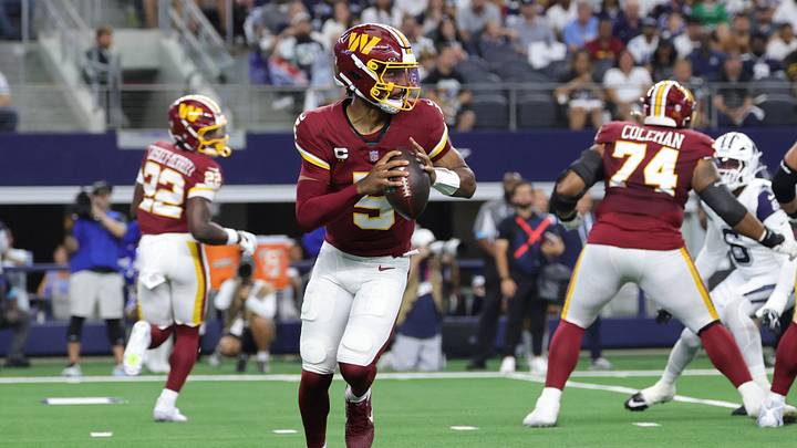 Sep 20, 2026; Arlington, Texas, USA; Washington Commanders quarterback Jayden Daniels (5) looks to pass the ball against the Dallas Cowboys during the first quarter at AT&T Stadium. Mandatory Credit: Kevin Jairaj-Imagn Images Sep 20, 2026; Arlington, Texas, USA; Washington Commanders quarterback Jayden Daniels (5) looks to pass the ball against the Dallas Cowboys during the first quarter at AT&T Stadium. Mandatory Credit: Kevin Jairaj-Imagn Images