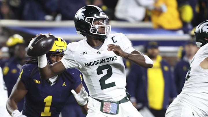 Oct 26, 2024; Ann Arbor, Michigan, USA;  Michigan State Spartans quarterback Aidan Chiles (2) passes in the second half against the Michigan Wolverines at Michigan Stadium. Mandatory Credit: Rick Osentoski-Imagn Images