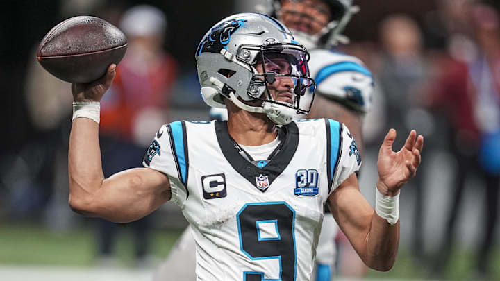 Jan 5, 2025; Atlanta, Georgia, USA; Carolina Panthers quarterback Bryce Young (9) passes on the run against the Atlanta Falcons during the second half at Mercedes-Benz Stadium. Mandatory Credit: Dale Zanine-Imagn Images