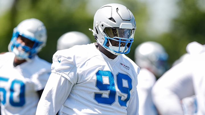 Detroit Lions defensive tackle Brodric Martin (99) practices during OTAs at Detroit Lions headquarters and practice facility in Allen Park on Tuesday, June 11, 2024.