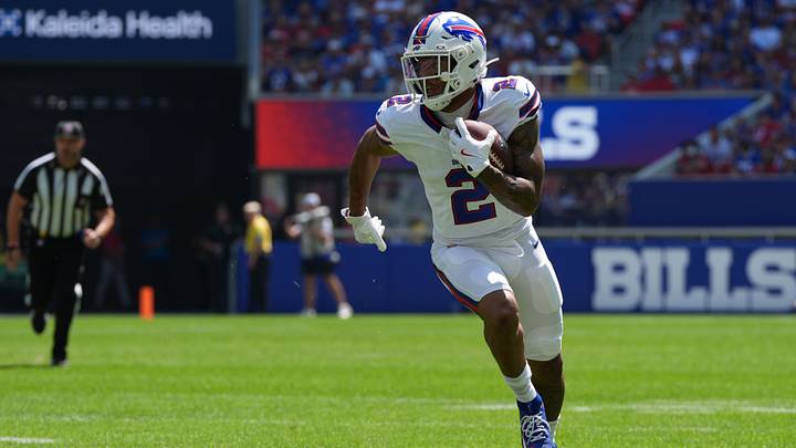 Aug 15, 2026; Orchard Park, New York, USA; Buffalo Bills wide receiver DJ Moore (2) runs with the ball after making a catch aginst the Carolina Panthers during the first half at New Highmark Stadium. Mandatory Credit: Gregory Fisher-Imagn Images