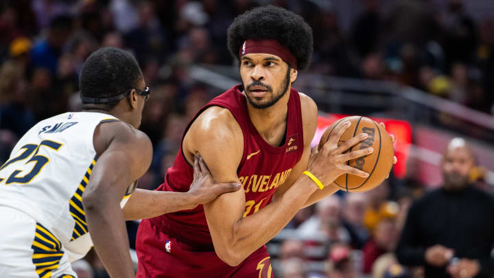 Mar 18, 2024; Indianapolis, Indiana, USA; Cleveland Cavaliers center Jarrett Allen (31) the ball while Indiana Pacers forward Jalen Smith (25) defends in the second half at Gainbridge Fieldhouse. Mar 18, 2024; Indianapolis, Indiana, USA; Cleveland Cavaliers center Jarrett Allen (31) the ball while Indiana Pacers forward Jalen Smith (25) defends in the second half at Gainbridge Fieldhouse.