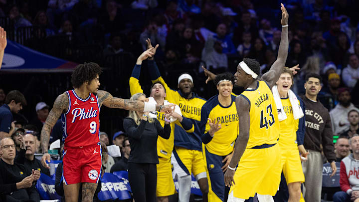 Dec 13, 2024; Philadelphia, Pennsylvania, USA; Indiana Pacers forward Pascal Siakam (43) reacts next to Philadelphia 76ers guard Kelly Oubre Jr. (9) after his three pointer during the fourth quarter at Wells Fargo Center. Mandatory Credit: Bill Streicher-Imagn Images