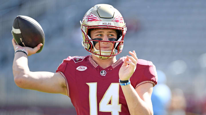 Nov 2, 2024; Tallahassee, Florida, USA;  Florida State Seminoles quarterback Luke Kromenhoek (14) warms up before a game against the North Carolina Tarheels at Doak S. Campbell Stadium. Mandatory Credit: Robert Myers-Imagn Images