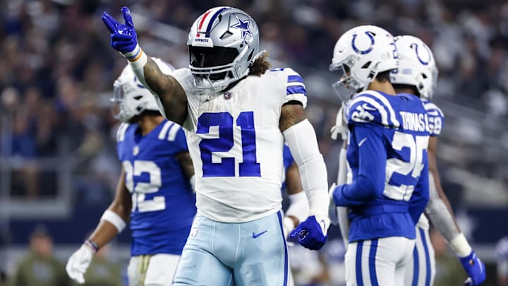 Dec 4, 2022; Arlington, Texas, USA;  Dallas Cowboys running back Ezekiel Elliott (21) reacts during
