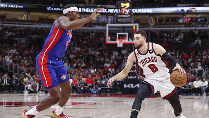 Apr 9, 2023; Chicago, Illinois, USA; Chicago Bulls guard Zach LaVine (8) drives to the basket against Jalen Duren of the Detroit Pistons