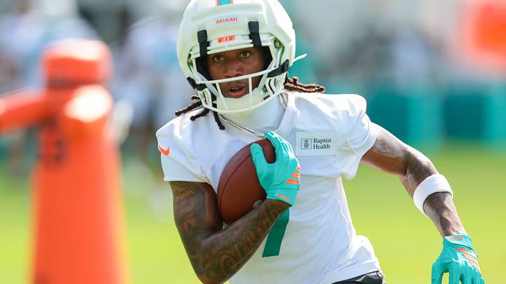 Jul 30, 2026; Miami Gardens, FL, USA; Miami Dolphins wide receiver Caleb Douglas (7) runs with the football during practice at Baptist Health Training Complex. Mandatory Credit: Sam Navarro-Imagn Images Jul 30, 2026; Miami Gardens, FL, USA; Miami Dolphins wide receiver Caleb Douglas (7) runs with the football during practice at Baptist Health Training Complex. Mandatory Credit: Sam Navarro-Imagn Images