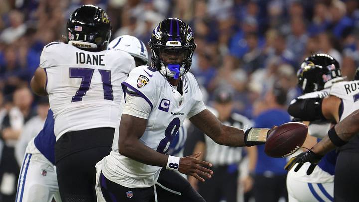 Sep 13, 2026; Indianapolis, Indiana, USA;  Baltimore Ravens quarterback Lamar Jackson (8) looks to hand off the ball during the second half against the Indianapolis Colts at Lucas Oil Stadium.  Mandatory Credit: Trevor Ruszkowski-Imagn Images