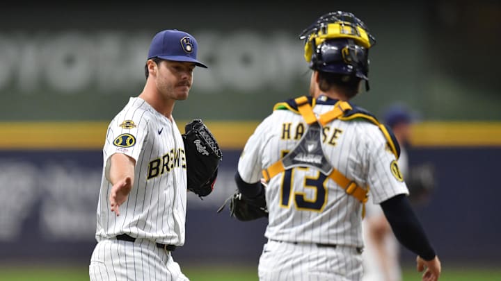 Apr 20, 2025; Milwaukee, Wisconsin, USA; Milwaukee Brewers starting pitcher Logan Henderson (43) celebrates with catcher Eric Haase (13) in his MLB debut during a game against the Athletics at American Family Field. Mandatory Credit: Patrick Gorski-Imagn Images