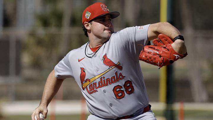 Feb 16, 2026; Jupiter, FL, USA; St. Louis Cardinals pitching prospect Max Rajcic (68) throws a pitch during spring training workouts at Roger Dean Stadium. Mandatory Credit: Reinhold Matay-Imagn Images Feb 16, 2026; Jupiter, FL, USA; St. Louis Cardinals pitching prospect Max Rajcic (68) throws a pitch during spring training workouts at Roger Dean Stadium. Mandatory Credit: Reinhold Matay-Imagn Images