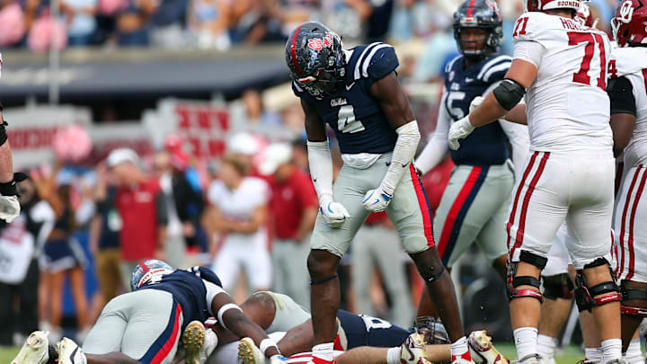 Oct 26, 2024; Oxford, Mississippi, USA; Mississippi Rebels linebacker Suntarine Perkins (4) reacts after a tackle during the second half against the Oklahoma Sooners at Vaught-Hemingway Stadium. Mandatory Credit: Petre Thomas-Imagn Images