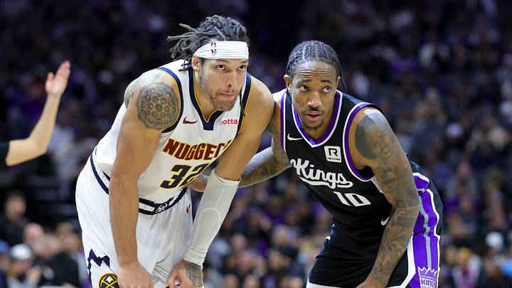 Dec 16, 2024; Sacramento, California, USA; Denver Nuggets forward Aaron Gordon (32) and Sacramento Kings forward DeMar DeRozan (10) during the second quarter at Golden 1 Center.