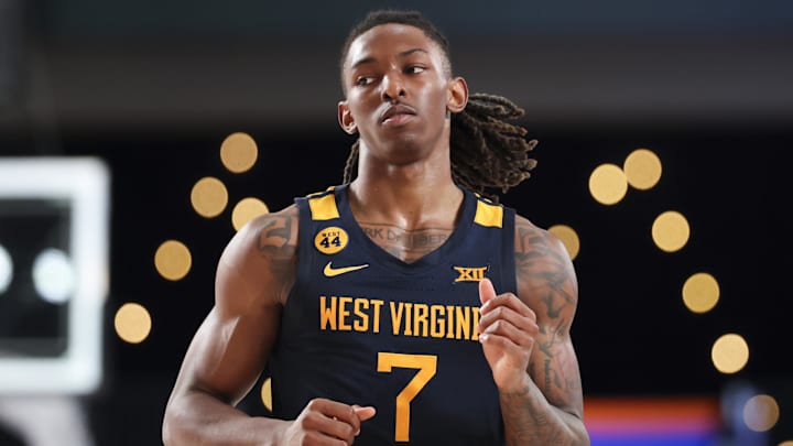 Nov 28, 2024; Paradise Island, Bahamas, BHS;  West Virginia Mountaineers guard Javon Small (7) reacts during the second half against the Louisville Cardinals at Imperial Arena at the Atlantis resort.  Mandatory Credit: Kevin Jairaj-Imagn Images