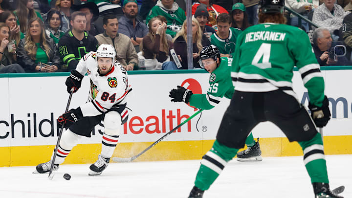 Dec 27, 2025; Dallas, Texas, USA; Chicago Blackhawks left wing Landon Slaggert (84) skates with the puck against Dallas Stars defenseman Thomas Harley (55) during the first period at American Airlines Center. Mandatory Credit: Chris Jones-Imagn Images Dec 27, 2025; Dallas, Texas, USA; Chicago Blackhawks left wing Landon Slaggert (84) skates with the puck against Dallas Stars defenseman Thomas Harley (55) during the first period at American Airlines Center. Mandatory Credit: Chris Jones-Imagn Images