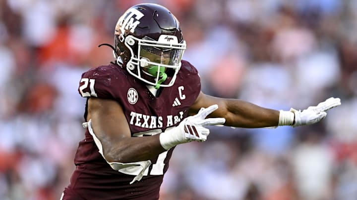 Sep 27, 2025; College Station, Texas, USA; Texas A&M Aggies linebacker Taurean York (21) defends in coverage against the Auburn Tigers during the fourth quarter at Kyle Field.