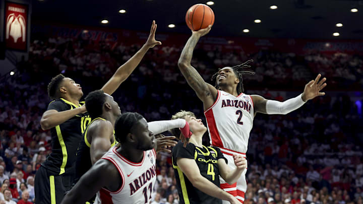 Mar 2, 2024; Tucson, Arizona, USA; Arizona Wildcats guard Caleb Love (2) shoots a basket against