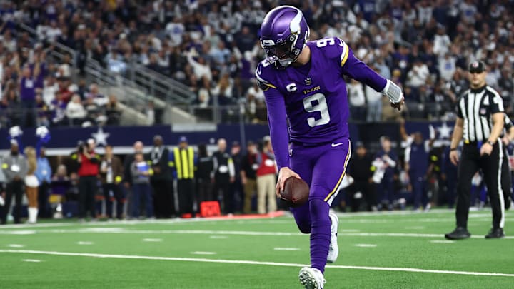 Dec 14, 2025; Arlington, Texas, USA; Minnesota Vikings quarterback J.J. McCarthy (9) runs for a touchdown during the first half against the Dallas Cowboys at AT&T Stadium. Mandatory Credit: Kevin Jairaj-Imagn Images